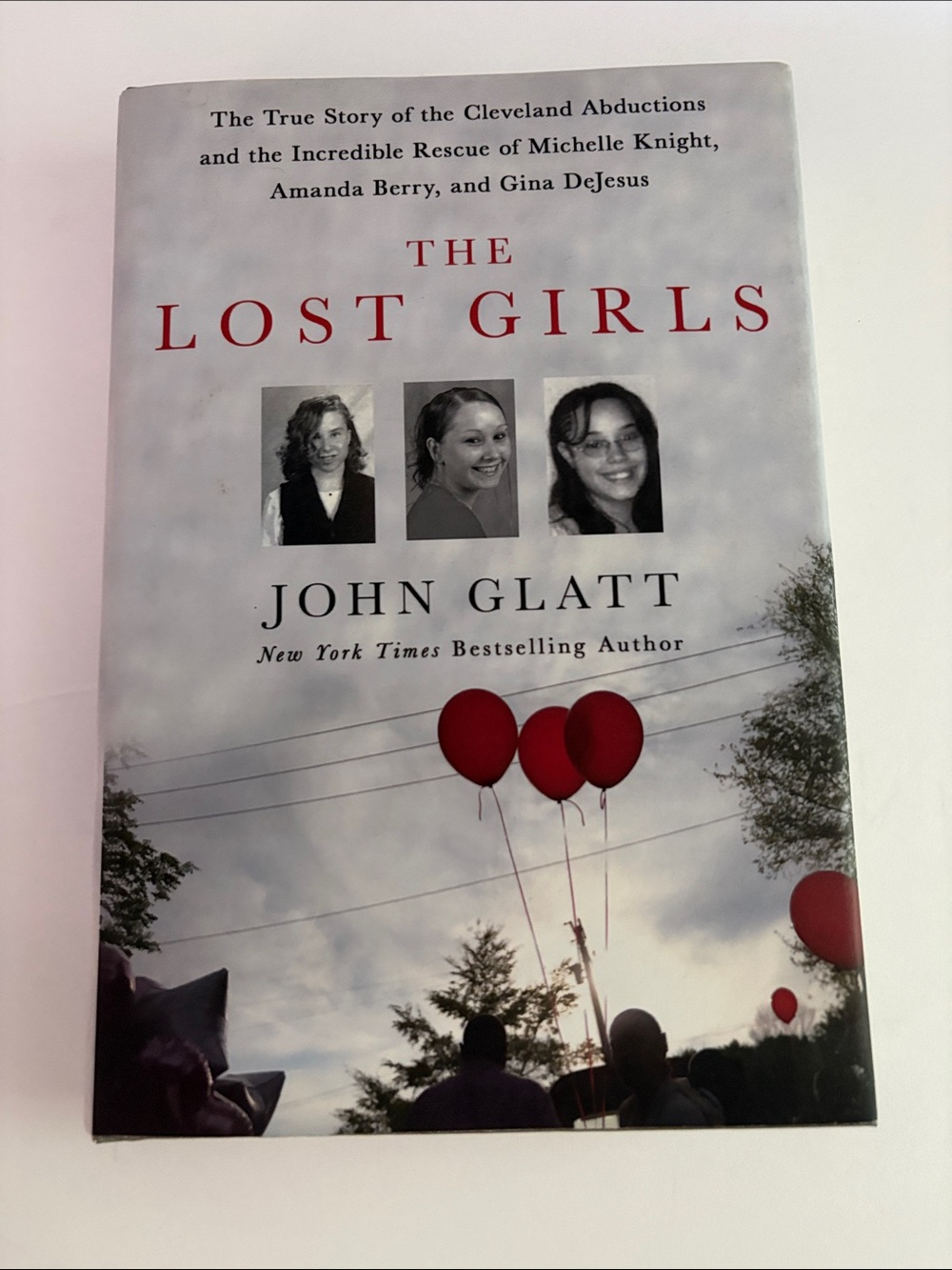 The Lost Girls by John Glatt - Hardcover Book with Red Accents